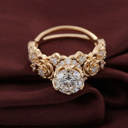 floral round moissanite engagement ring in solid 14k yellow gold featuring rose-inspired diamond accents and split shank design.