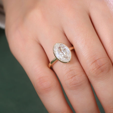 classic oval bezel engagement ring