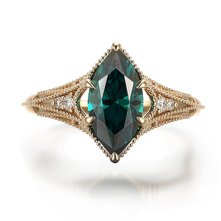 green marquise cut moissanite engagement ring in yellow gold with vintage split shank and accent diamonds worn on finger.