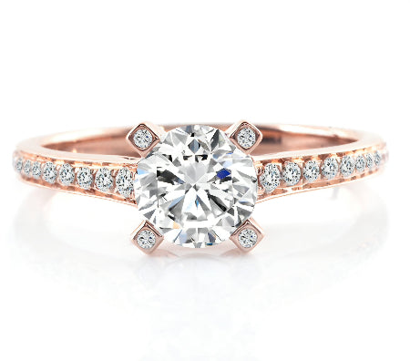 round brilliant moissanite engagement ring in solid 14k rose gold featuring a hidden halo setting and pavé accent band.