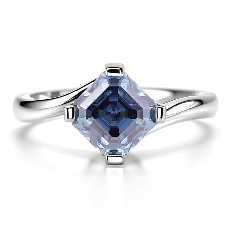 princess cut blue sapphire solitaire engagement ring in solid white gold with twisted band
