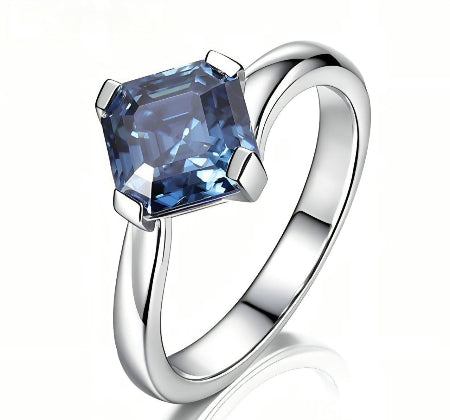 princess cut blue sapphire solitaire engagement ring in solid white gold with twisted band