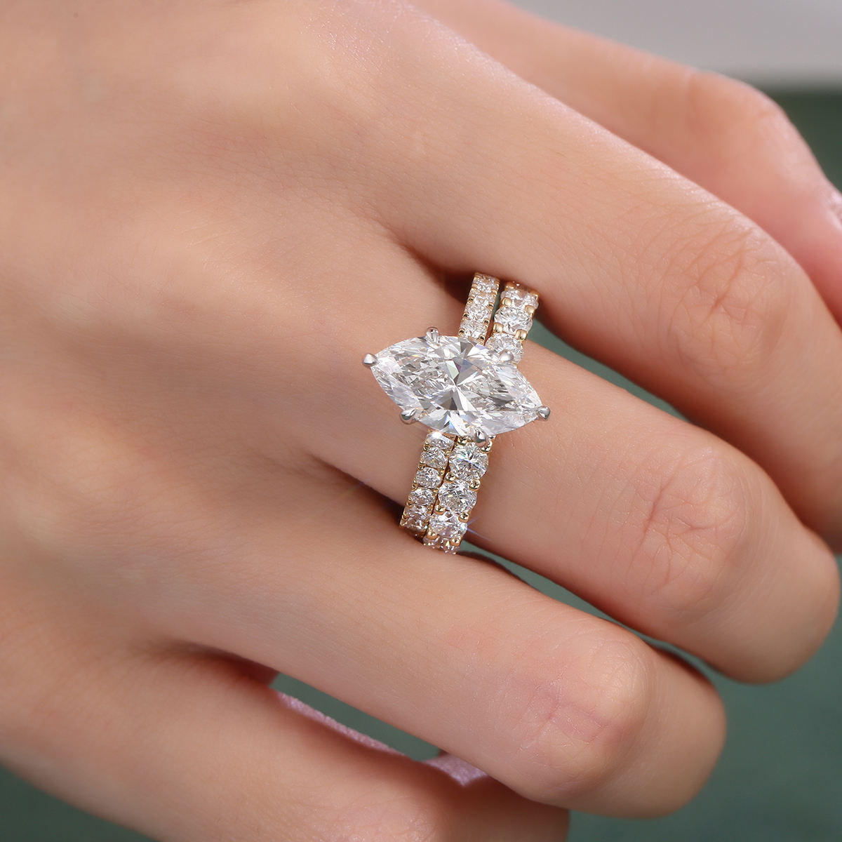 Marquise cut moissanite engagement ring set in solid 10K rose gold with hidden halo solitaire and matching eternity wedding band