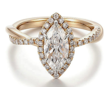 Marquise cut moissanite halo engagement ring in solid 14K yellow gold featuring a twisted pavé band and sparkling halo setting