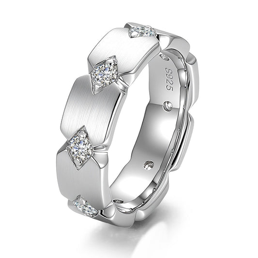 Men's 14K white gold moissanite wedding band with brushed matte finish, round moissanite diamonds, and modern geometric hexagon design.