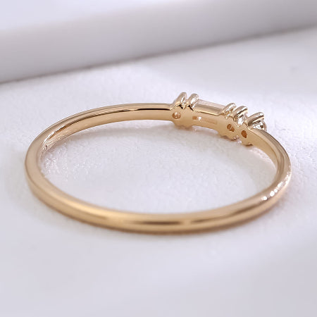 minimalist 14k solid gold baguette diamond stacking ring with round side diamonds