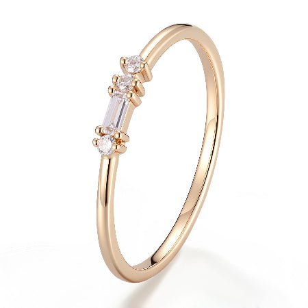 minimalist 14k solid gold baguette diamond stacking ring with round side diamonds