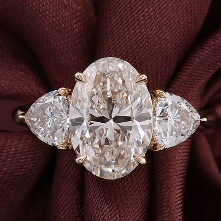 3 tcw oval brilliant cut three stone moissanite engagement ring