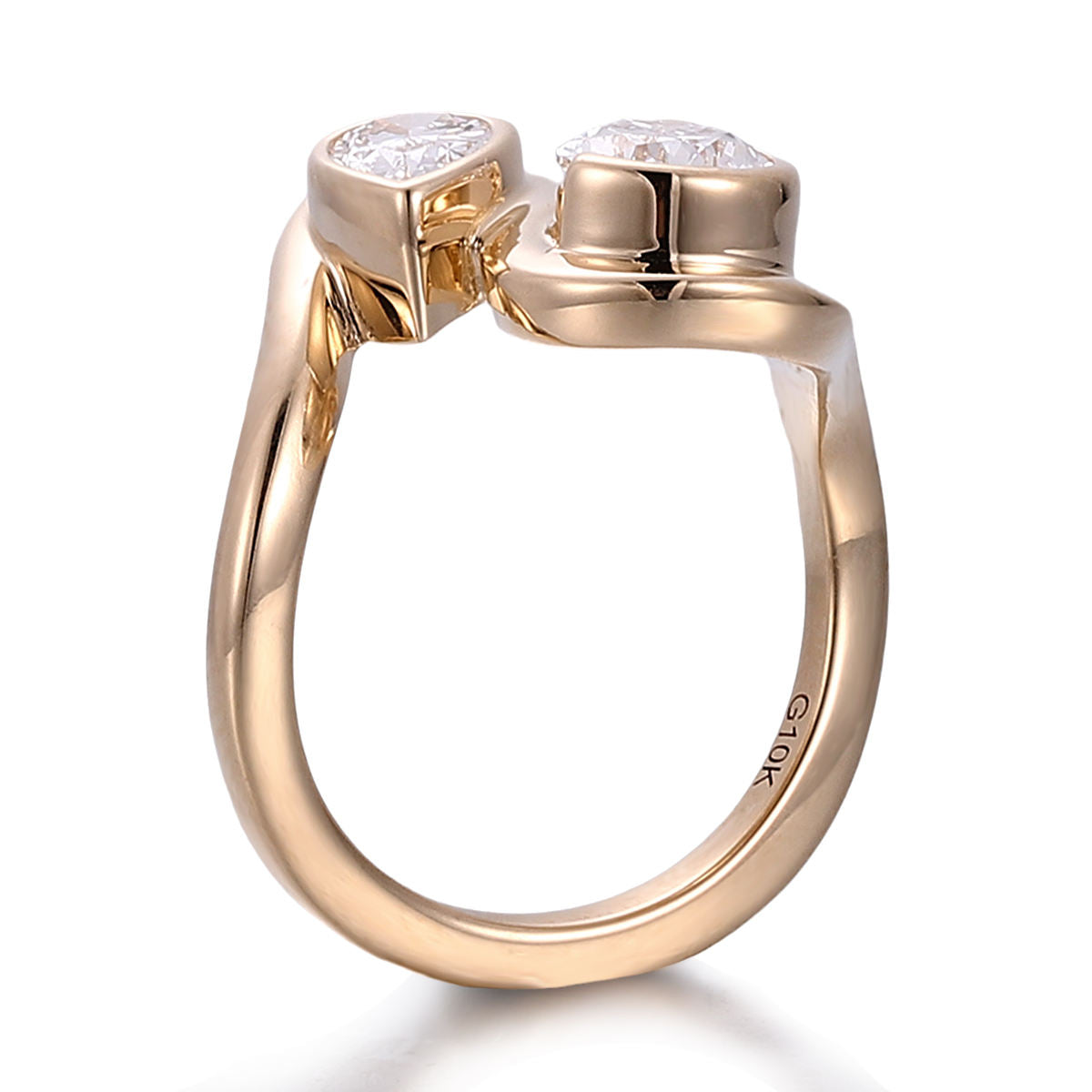 toi et moi pear cut moissanite engagement ring in 10k rose gold featuring a modern open bypass design with two bezel-set pear stones