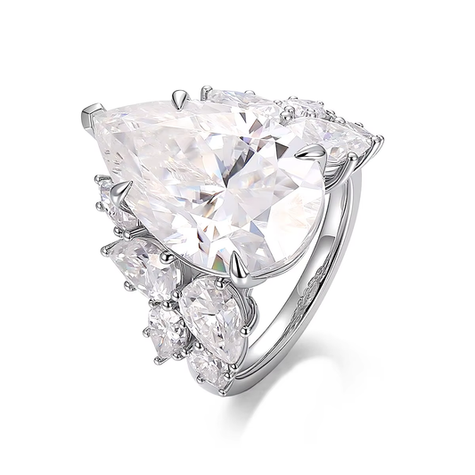 Large trillion cut moissanite engagement ring in 925 sterling silver with pear and round moissanite floral cluster side stones