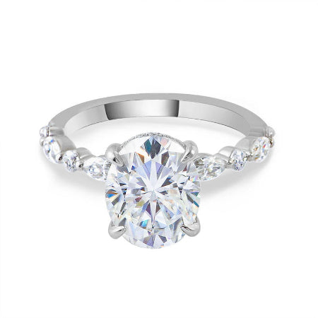 oval cut diamond ring with marquise and round diamond